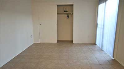 Broadway Apartments spacious bedroom and closet.